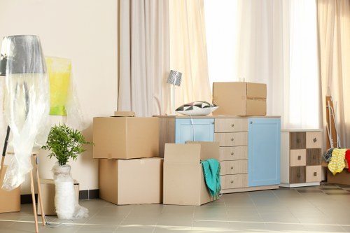 Removal team loading household items for a Stockwell home move
