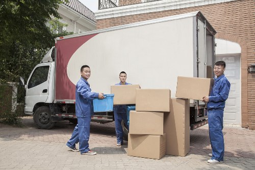 Local home moving team planning a move in Stockwell with boxes and furniture