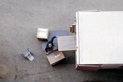 Local office movers handling furniture in Stockwell