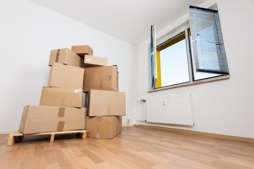 Prepared moving boxes and household items ready for collection in Stockwell