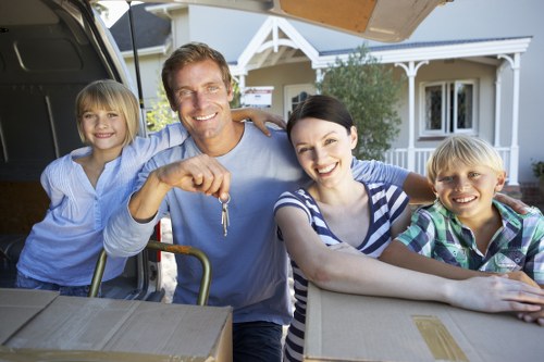 Professional team handling bulky sofas and household furniture in Stockwell