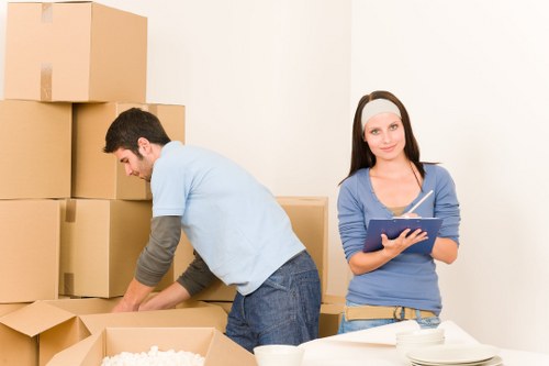 Careful handling of student boxes and desk items during a Stockwell move