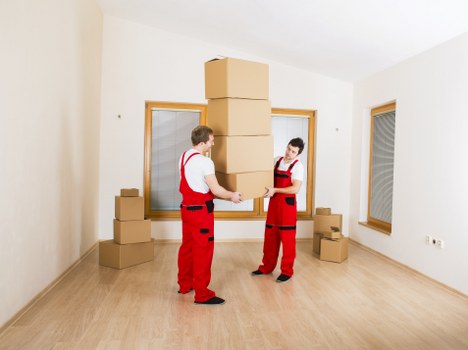 Supervisor reviewing safety procedures before a moving task